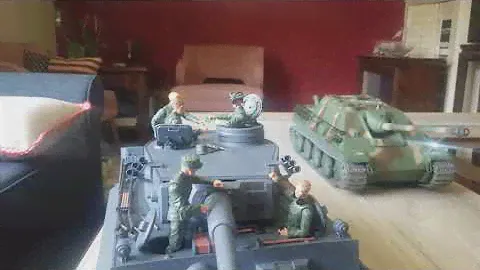 Marauder Gun Runners WW2 figures having a smoke on their Heng Long Tiger Tank.