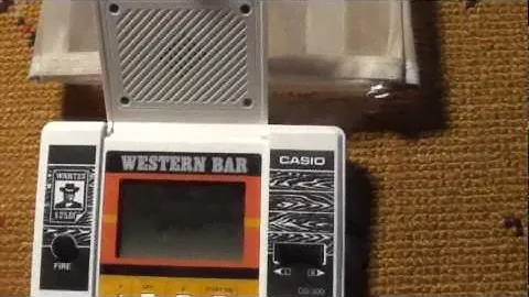 Casio CG-300 Western Bar Electronic LCD Handheld Game