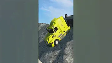 Western Star 57x loaded with CAT bulldozers hanging over the edge of a cliff